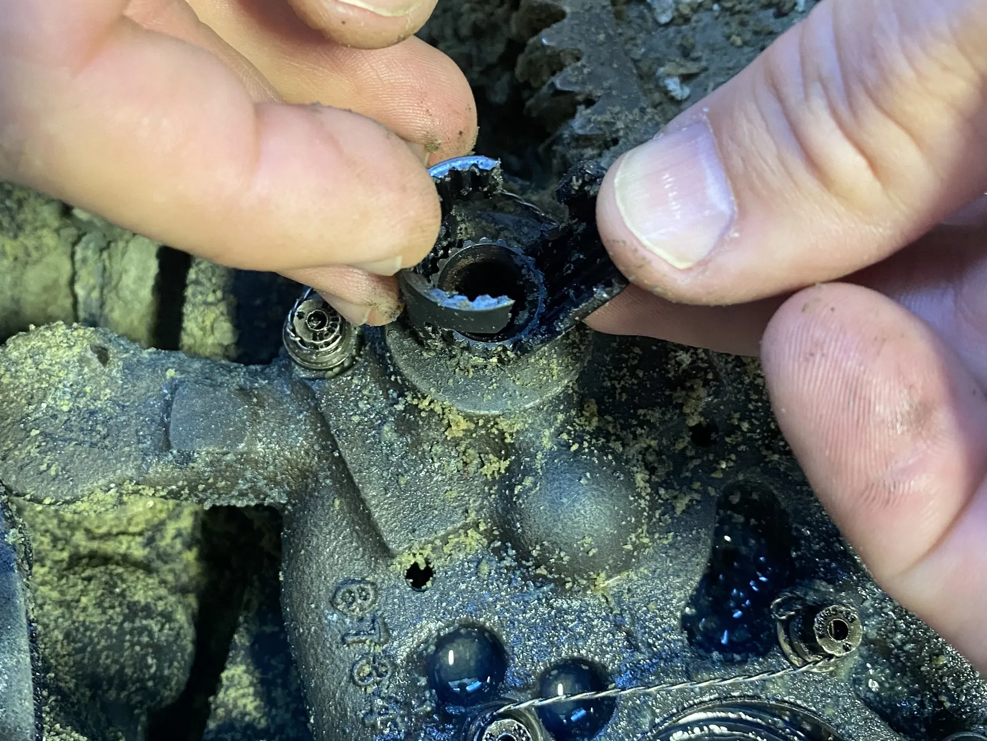 Opposite half of the accessory gearbox with the fractured drive shaft coupling to the oil pump input gearshaft