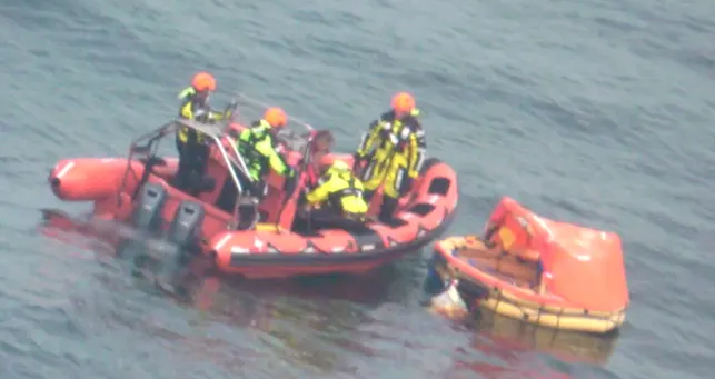 The figure shows the pilot and the passenger being picked up by the RHIB crew.