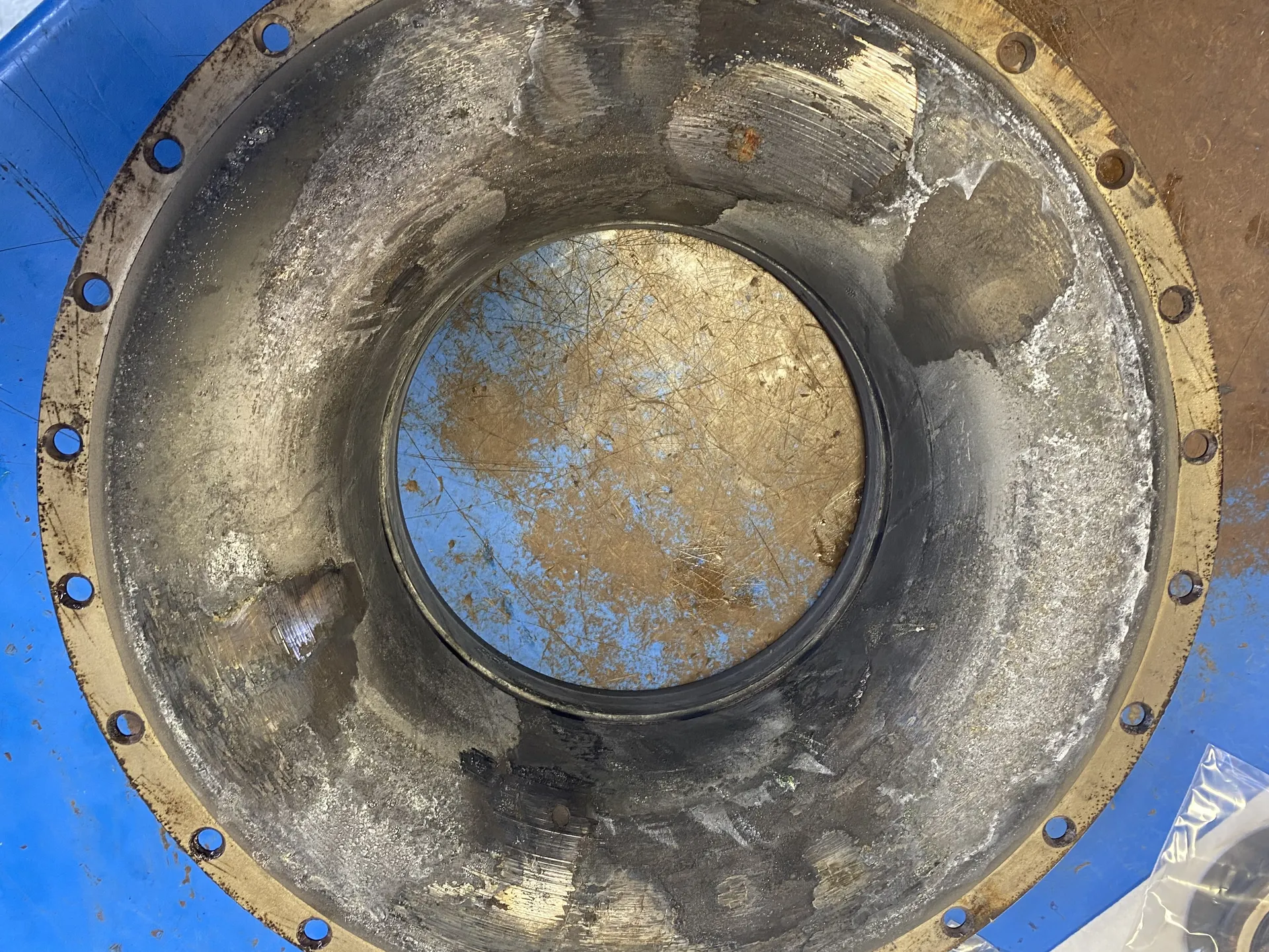 Impeller shroud rub marks caused by contact with the impeller blades